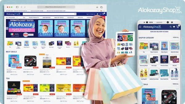 A happy woman shopping online with her phone and from FMCG brands websites
